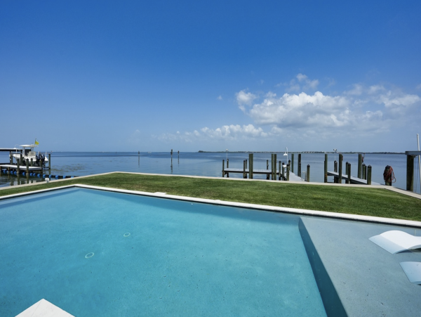 Bayfront Luxury Vacation Rental in Holmes Beach with Private Dock, Pool & Spa